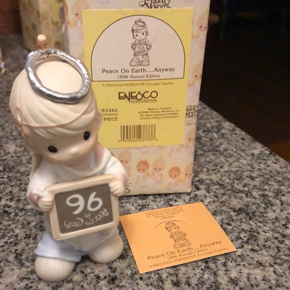 Precious Moments Accessories - Precious Moments 1996 Annual Edition “Peace On Earth….Anyway” porcelain figurine